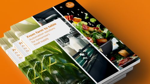 ifm食品杂志 “从农场到餐桌 ”堆放在橙色背景前