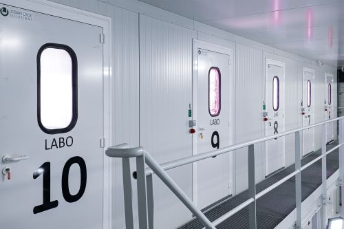 Closed doors of individual laboratories for plant research.