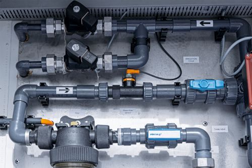 View of a sensor installed for water flow monitoring in the Module X vertical farming module from Urban Crop Solutions.