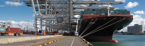 A container ship docks at the port terminal